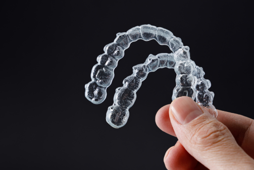 close up of two clear invisalign sydney aligners