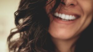 girl with straight white teeth and smile