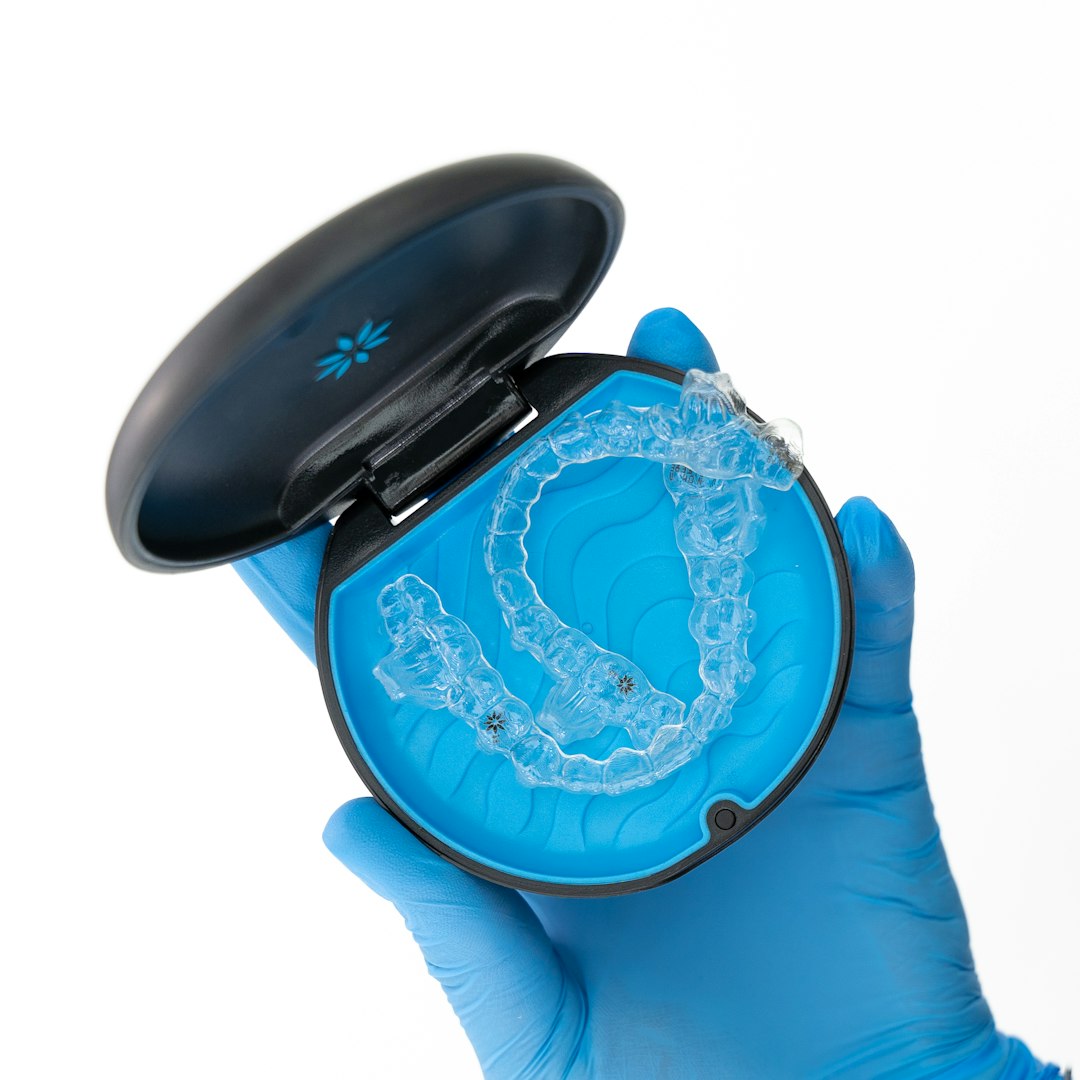 clear invisalign aligners near me in a retainer case