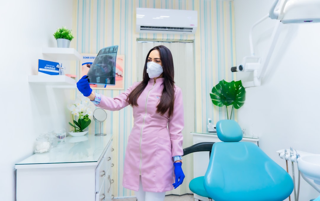 orthodontist perth holding up x-ray